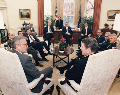 President Reagan, Vice President Bush, and Fed Chairman Greenspan meeting in the Oval Office on the evening of October 19, 1987