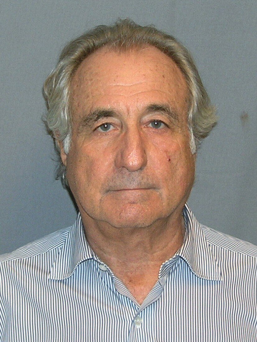 Bernard Madoff in dark suit, frontal mugshot photo