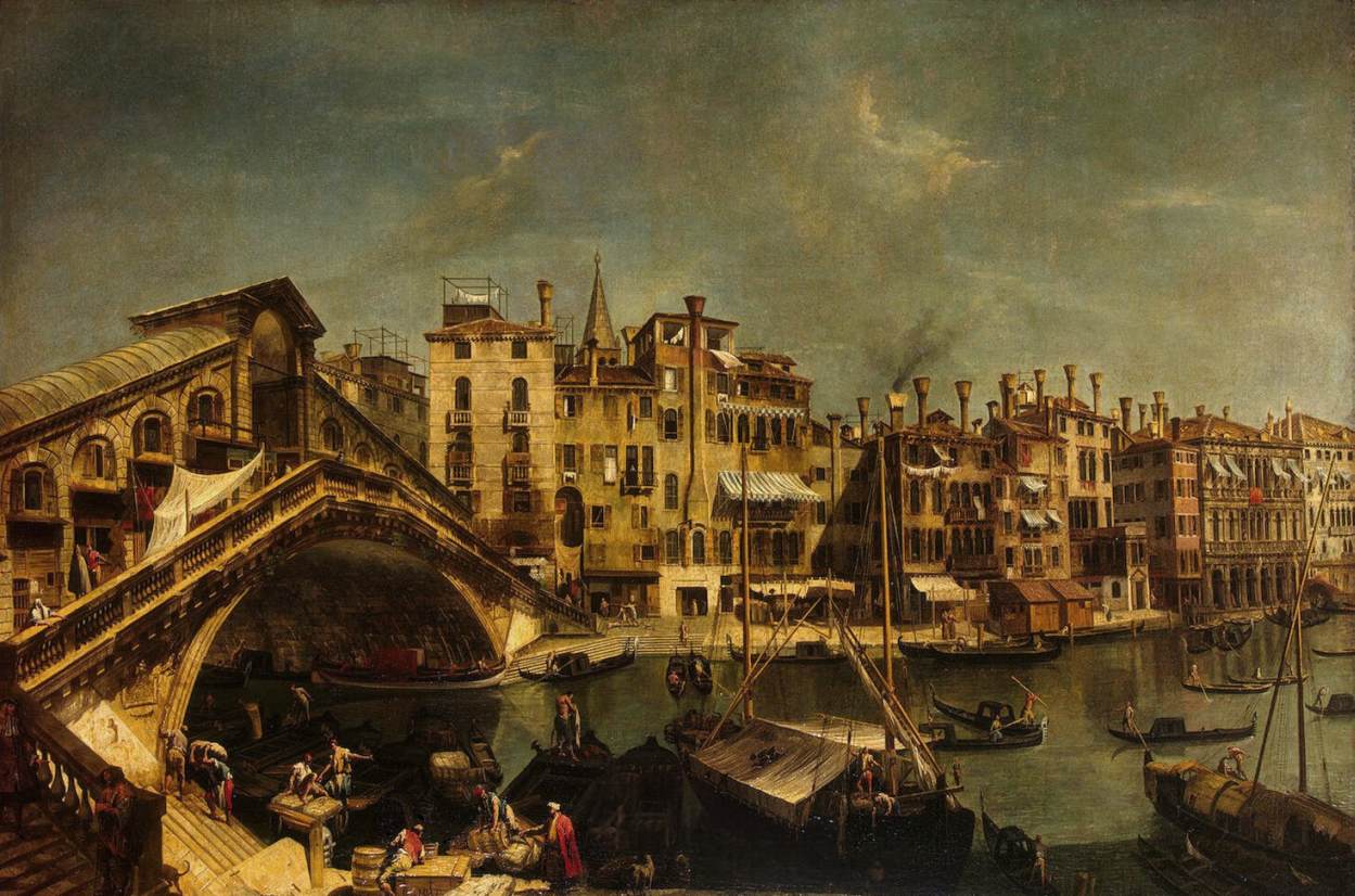 Eighteenth-century painting of Venice's Rialto Bridge spanning the Grand Canal, with palaces lining the water and gondolas crowding the foreground.